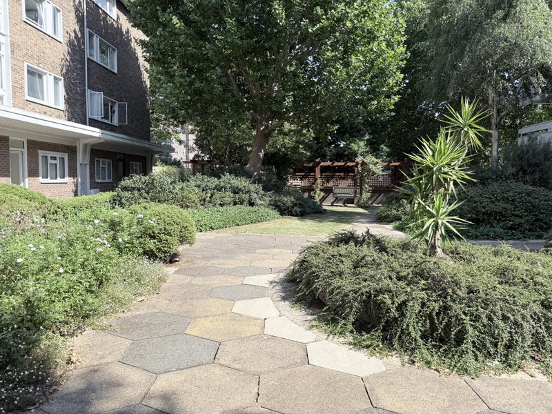 Photo 1: Front Garden