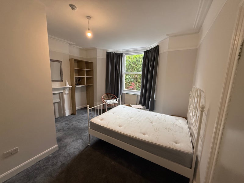 Photo 1: Large double room ground floor ensuite