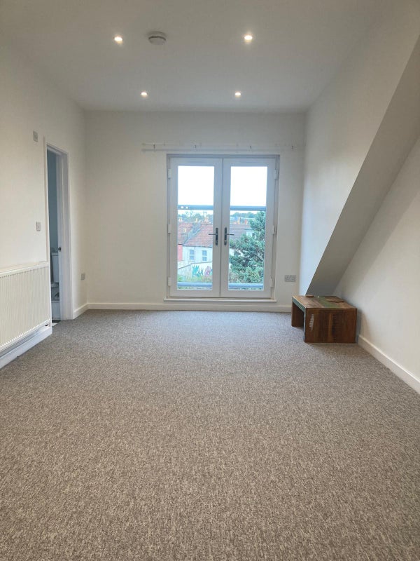 Photo 1: Attic room