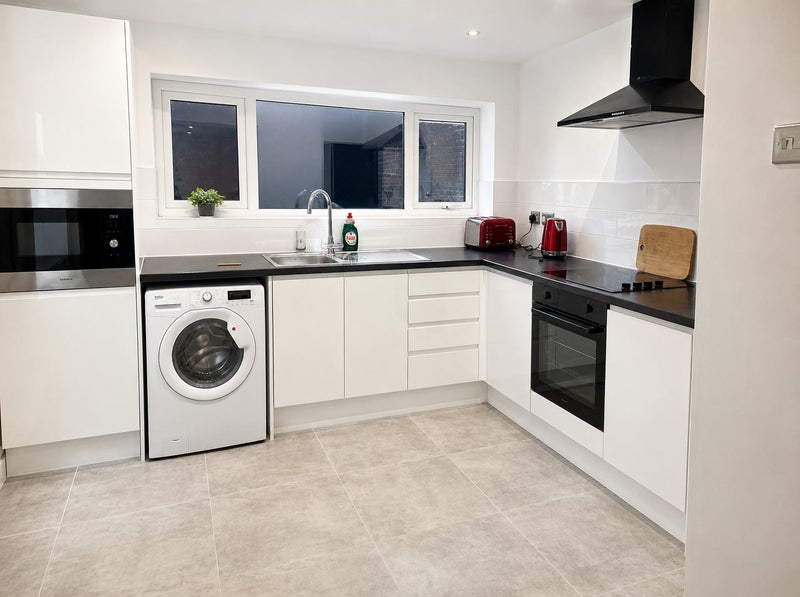 Photo 1: Kitchen