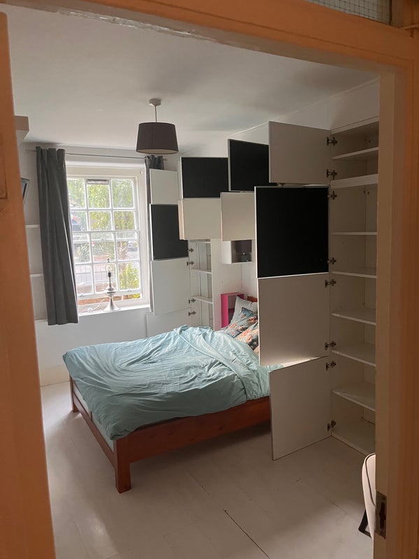Photo 1: Soft close cupboards in bedroom provide plenty of storage 
