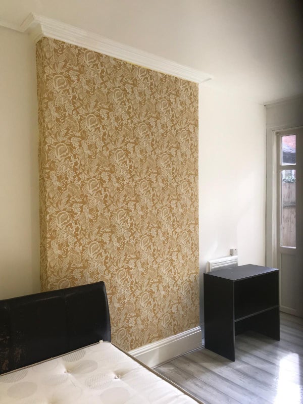Photo 1: ground floor rear bedroom 