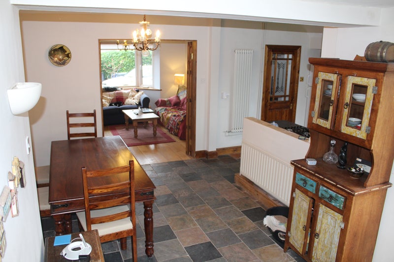 Photo 1: Open plan kitchen dining room
