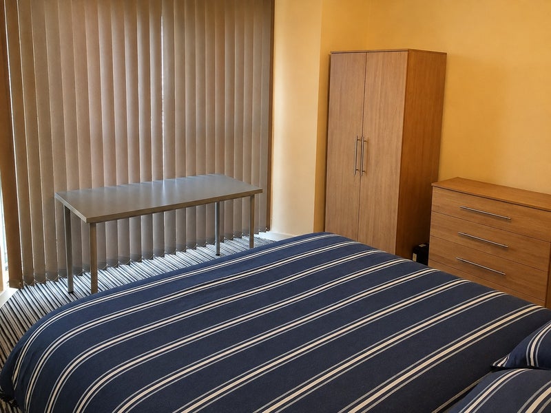 Photo 1: Downstairs Front Bedroom