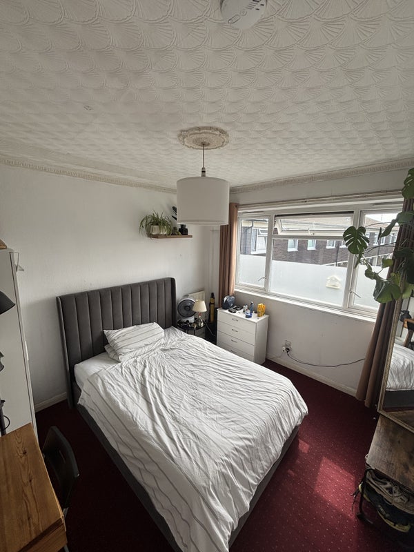 Photo 1: Photo 1 - bed is an Ottoman so lifts up to provide extra storage