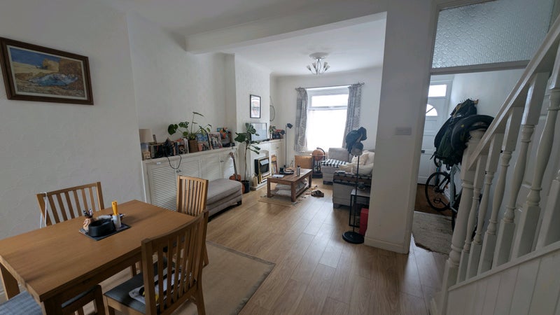 Photo 1: Living/dining room