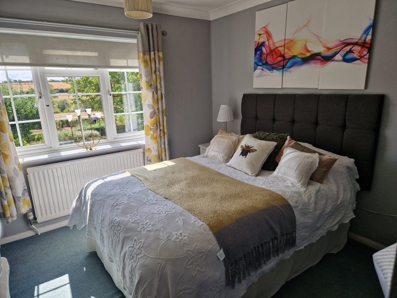 Photo 1: Large bedroom with a view