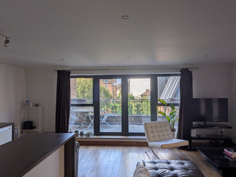 Photo 1: Shared living room