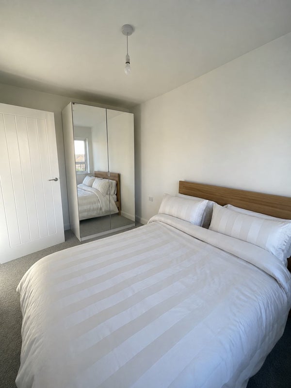 Photo 1: Double bed with wardrobe