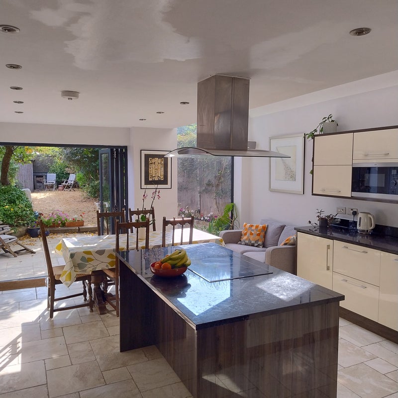 Photo 1: Big eat in kitchen with comfy sofa