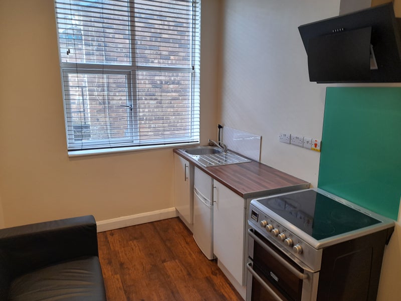 Photo 1: Kitchen Area