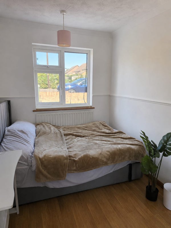 Photo 1: Bright furnished double bedroom with ottoman storage bed