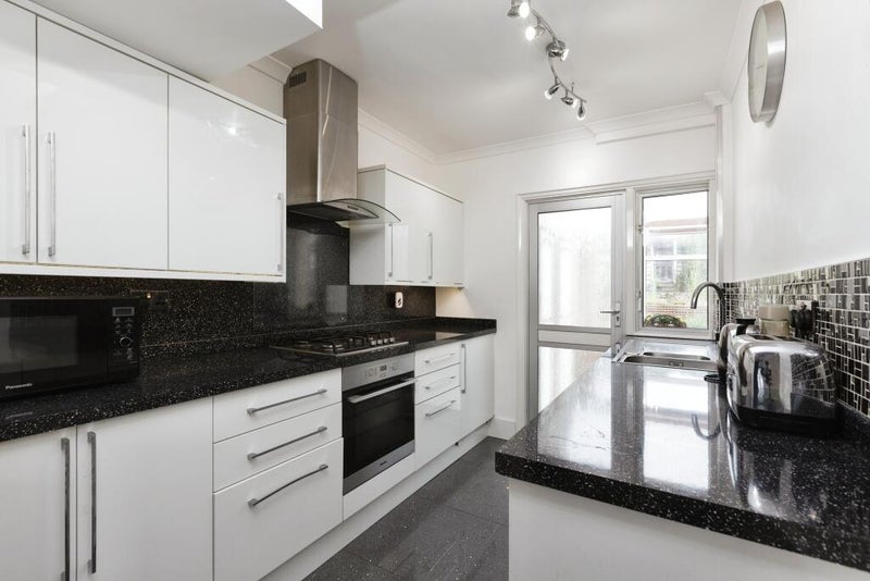 Photo 1: Kitchen