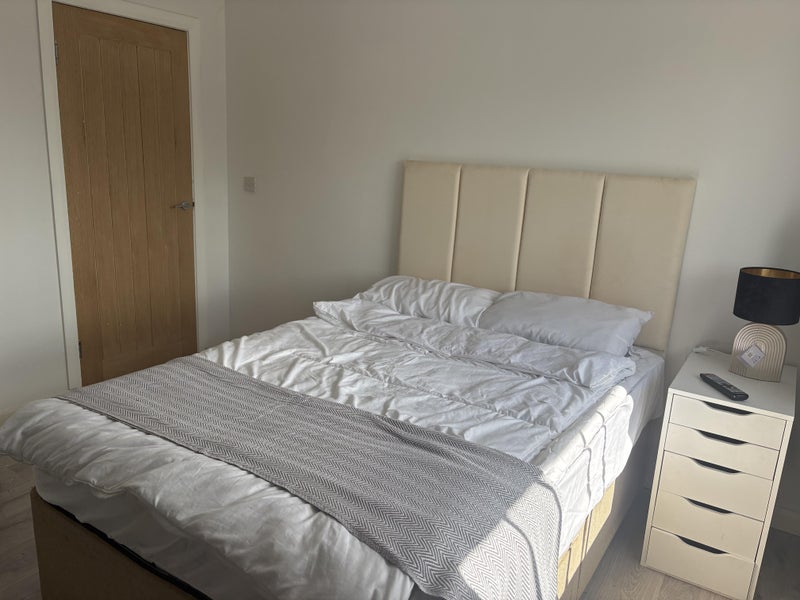 Photo 1: Bed with underneath storage 