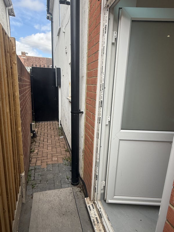 Photo 1: Private Entrance ( side of the property)