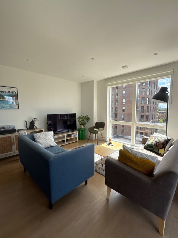Photo 1: Living room with Sony smart TV