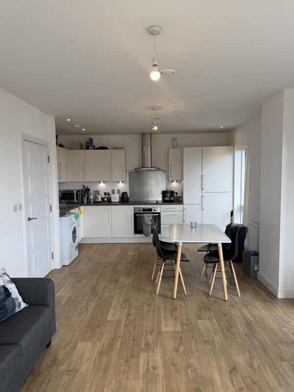 Photo 1: Shared Living Room & Kitchen