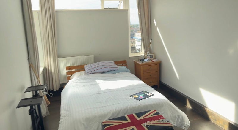 Photo 1: Bedroom - Lots of Light. just the bed and nightstand and uk box will stay)