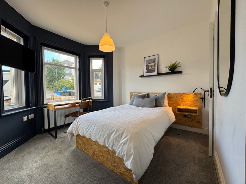 Photo 1: WFH | Bright bedroom & desk area