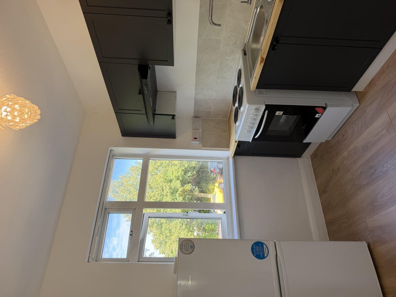 Photo 1: Kitchen