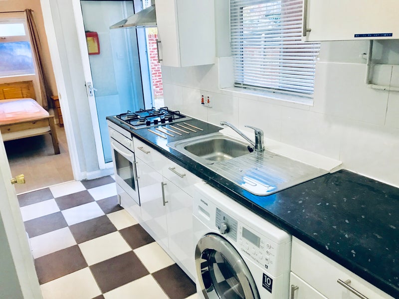 Photo 1: Kitchen