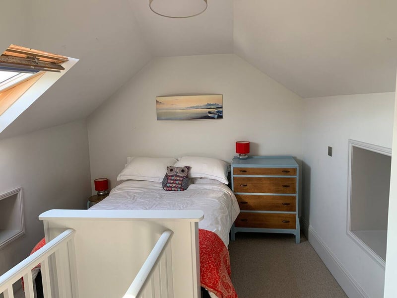 Photo 1: Attic bedroom