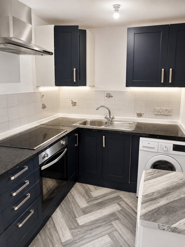 Photo 1: Kitchen