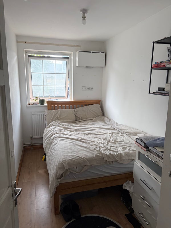 Photo 1: This is the bedroom for rent, there is a built in wardrobe and ample storage space upstairs 