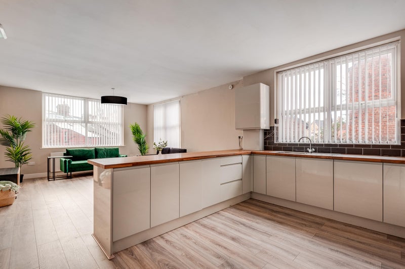 Photo 1: Kitchen/ Living Area 