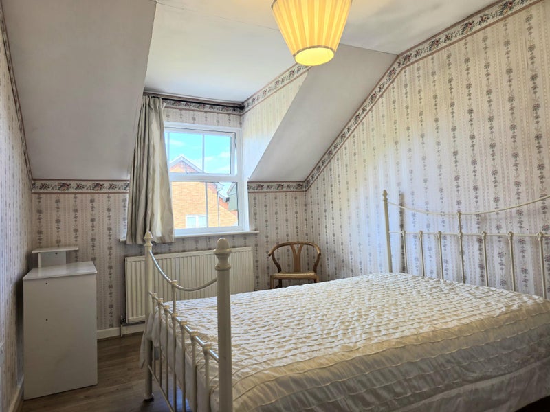 Photo 1: Well lit room with generous space & double bed