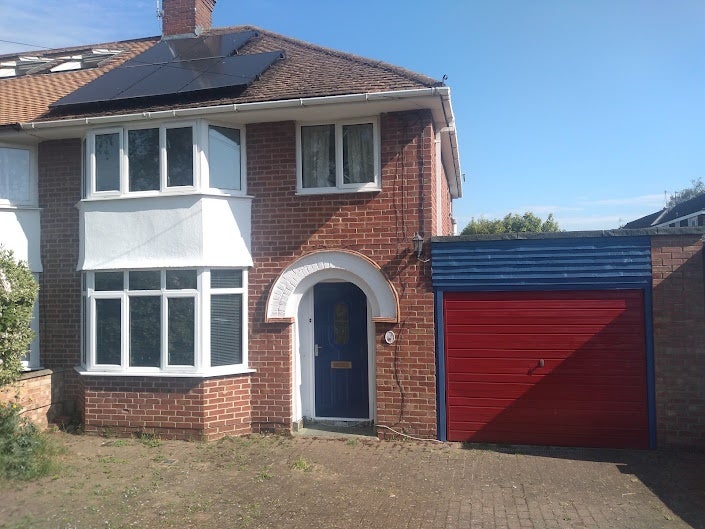 Photo 1: Off street parking at the front