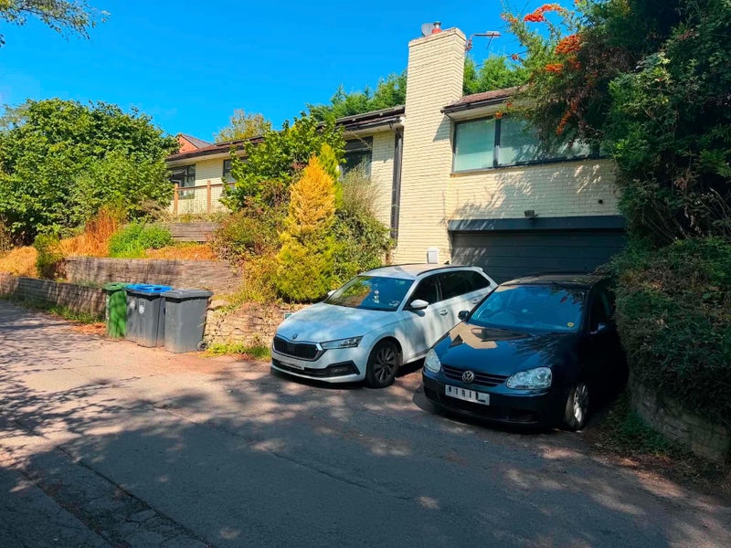 Photo 1: Front of property