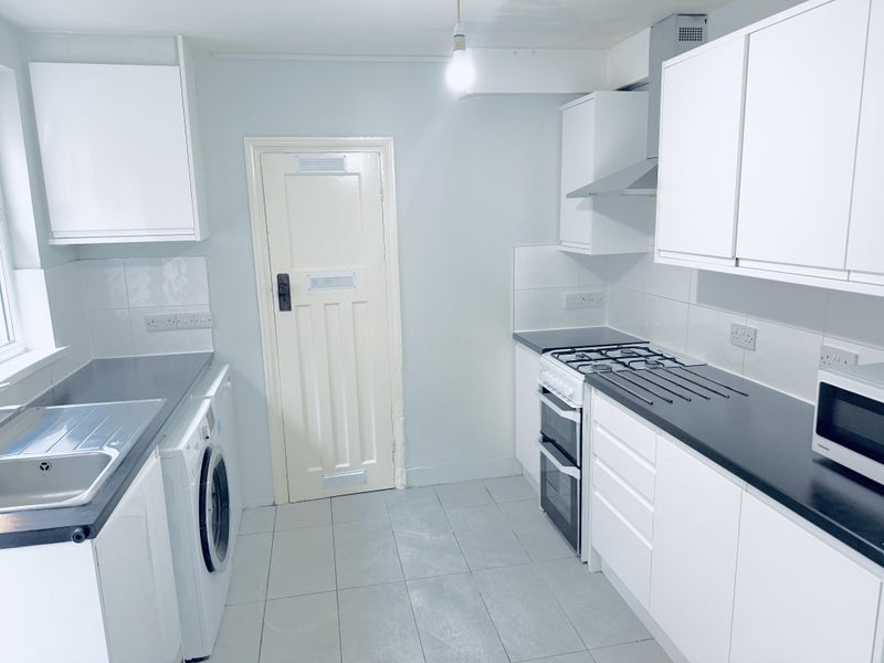 Photo 1: Kitchen