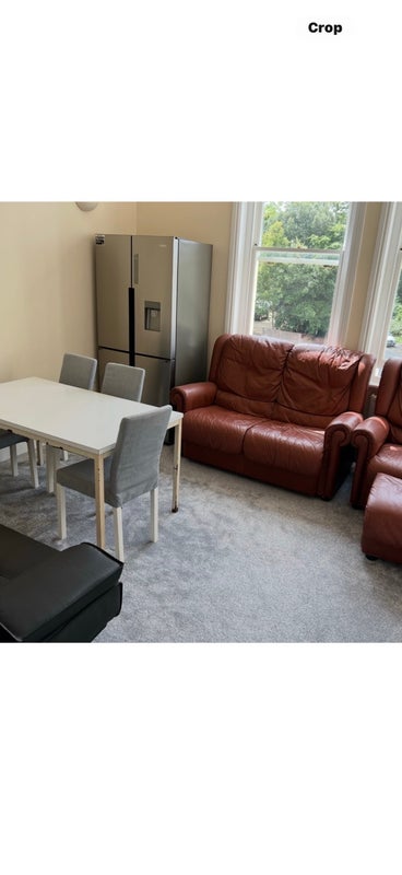 Photo 1: The living/dining room 