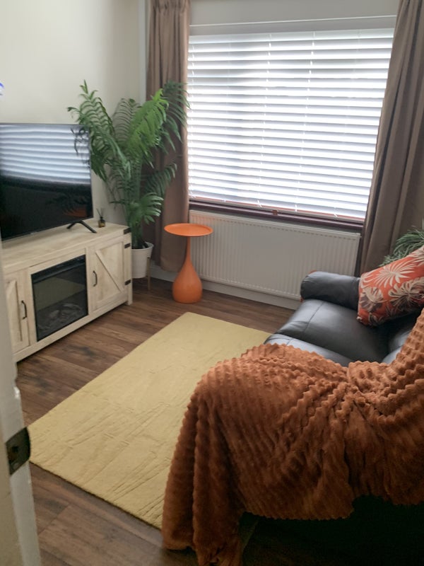 Photo 1: Snug living room