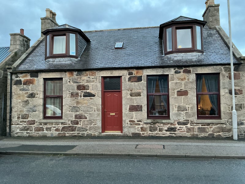 Photo 1: Front house