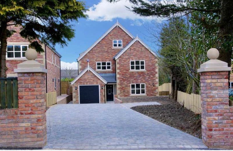 Photo 1: This is the electronic gated driveway