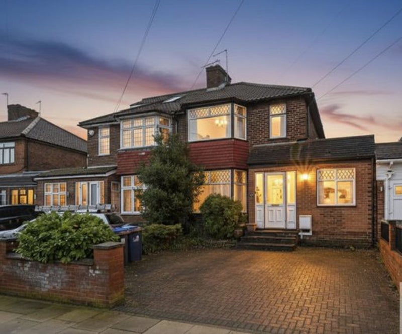 Photo 1: House Front
