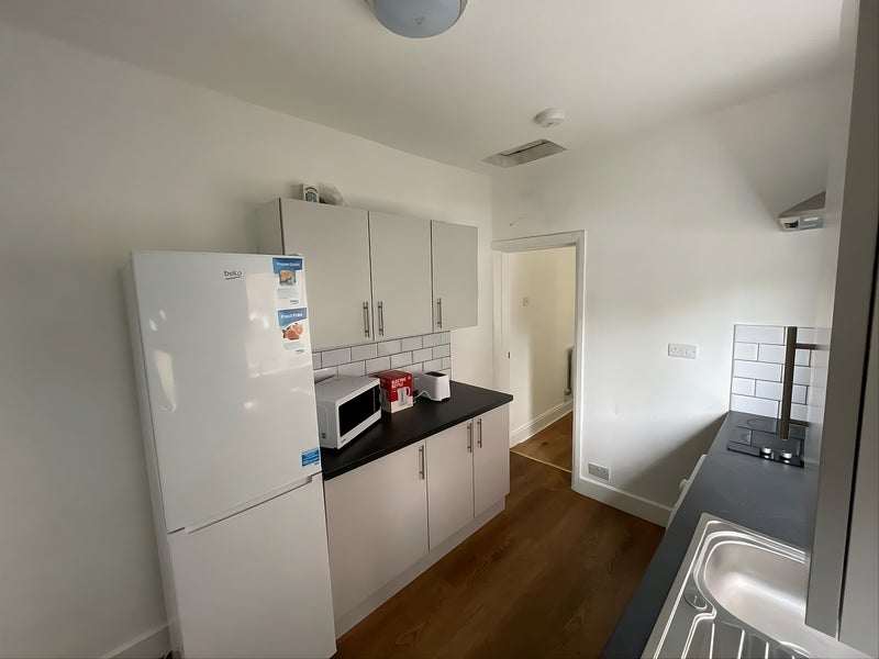 Photo 1: Kitchen