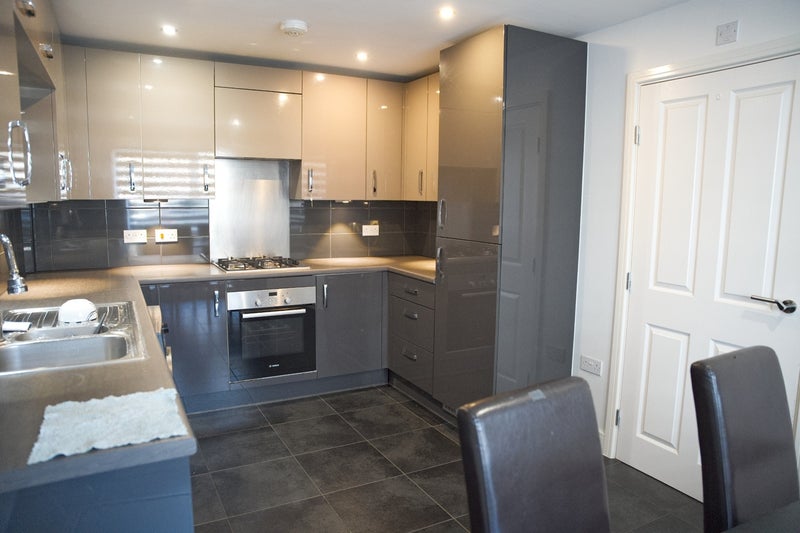 Photo 1: Kitchen