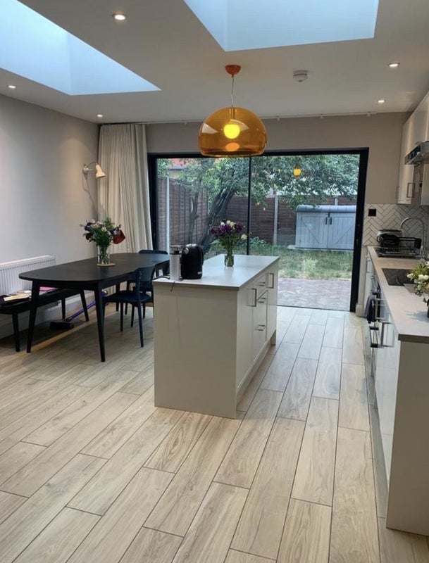 Photo 1: Kitchen / Dining Space