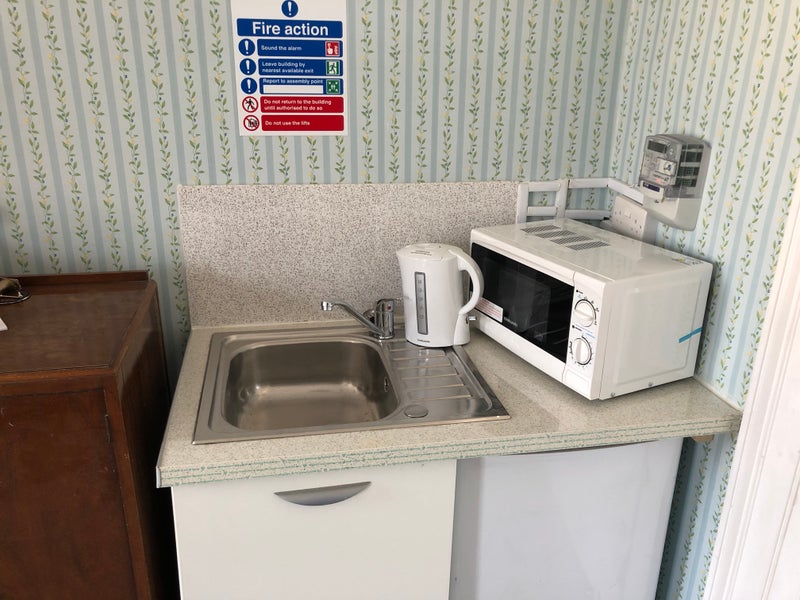 Photo 1: kitchenette inside bedroom