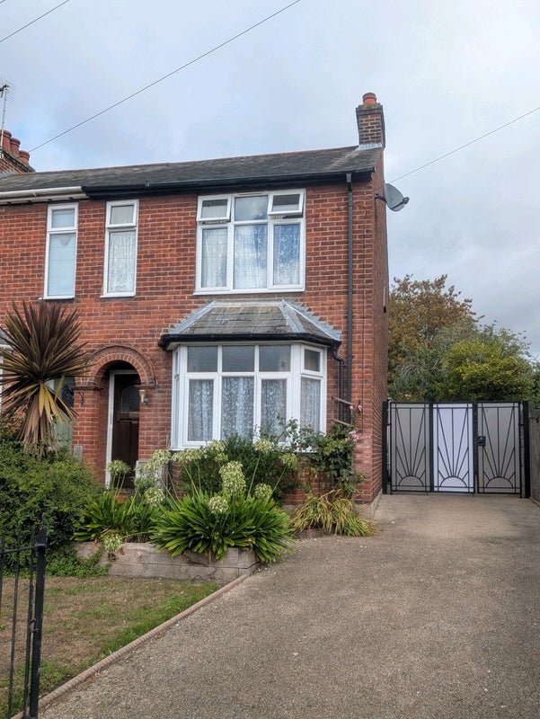 Photo 1: Front of house