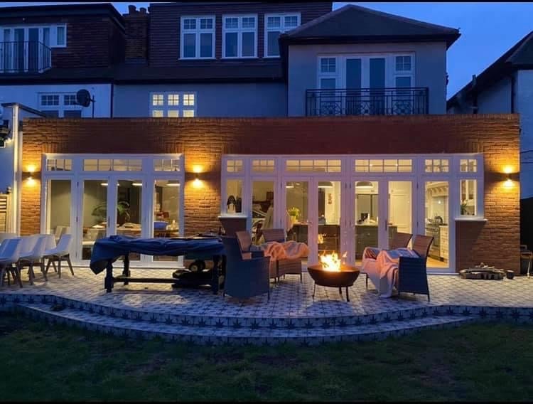 Photo 1: large home, bedroom to rent is the one with the light on