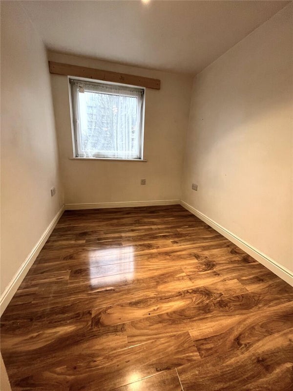 Photo 1: Furnished Single Bedroom (empty in this photo)