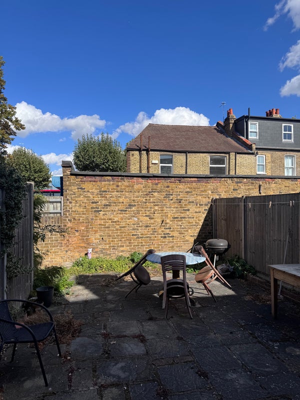 Photo 1: Back garden 