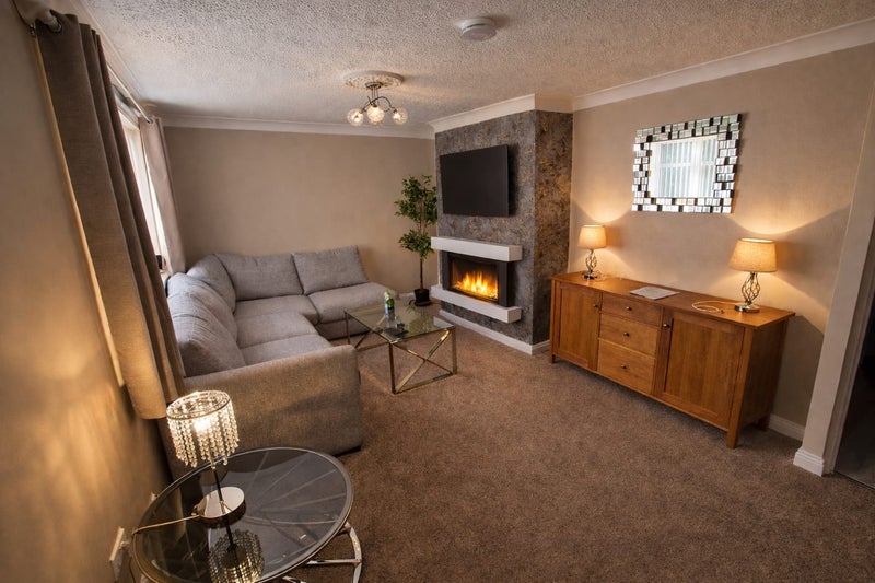 Photo 1: Front room 