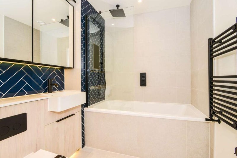 Photo 1: Bathroom with Bathtub