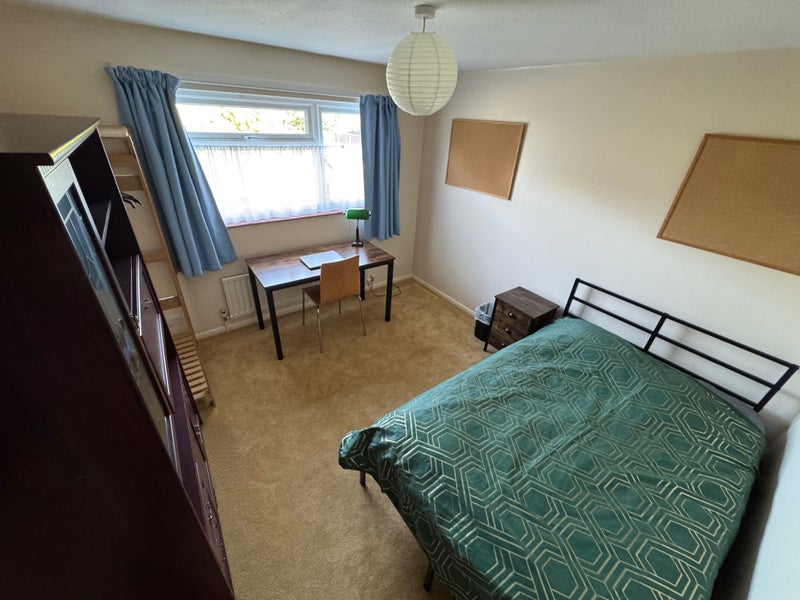 Photo 1: Flexible layout; blackout curtains