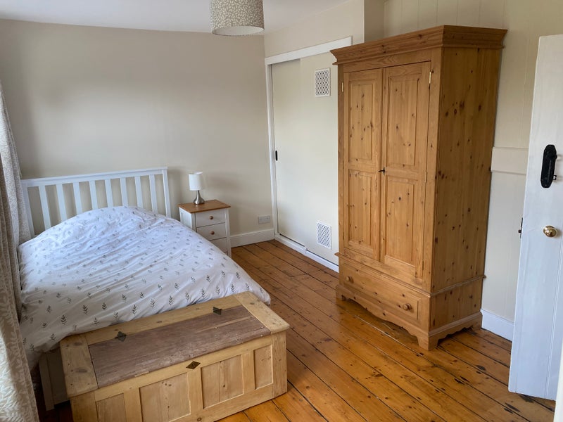 Photo 1: back bedroom